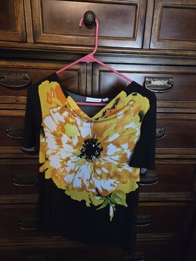 Susan Graver Black Liquid Knit Top with Orange and Yellow Floral Accent